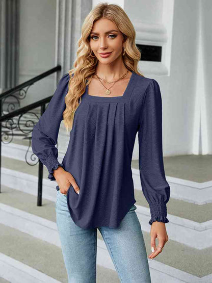 Blusa con cuello cuadrado y manga abullonada