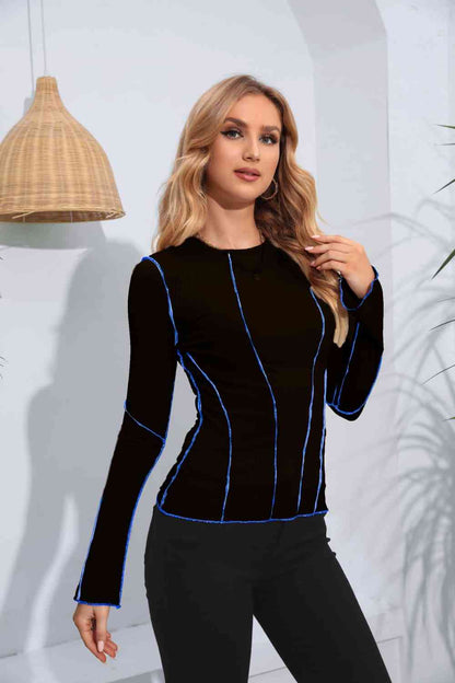 Blusa de manga larga con cuello redondo de canalé