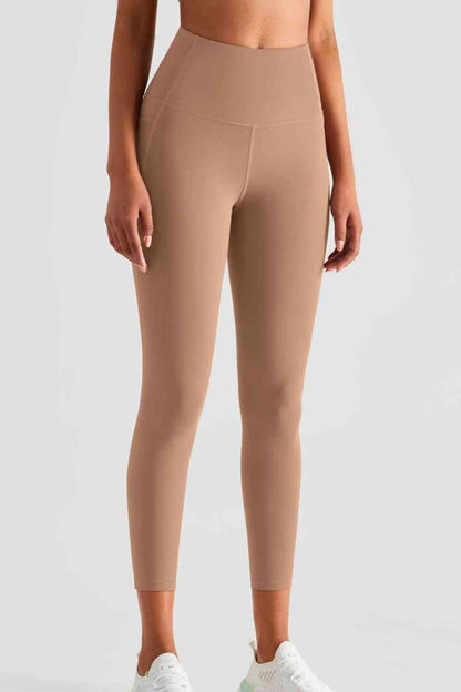 Leggings de sport à large ceinture avec poches