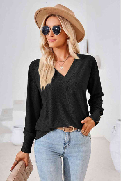 Blusa de manga larga con cuello en V