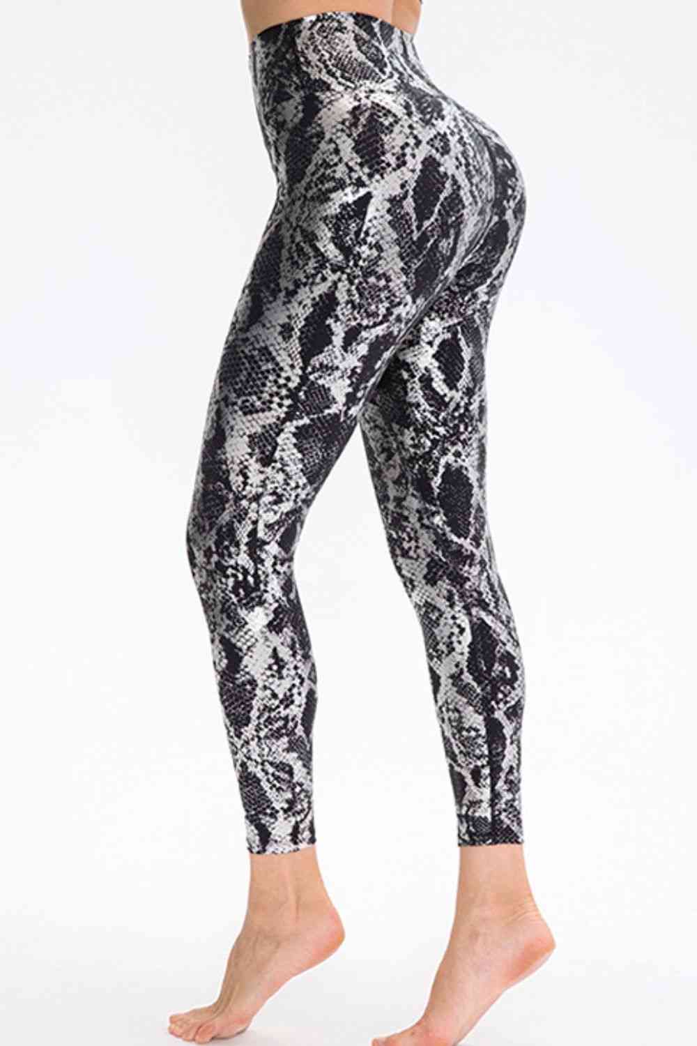 Pantalones deportivos largos con cinturilla ancha y corte slim con estampado animal