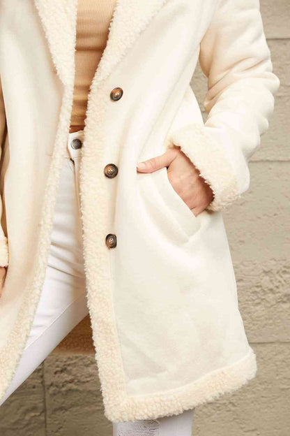 Manteau long avec doublure en peluche et col à revers double