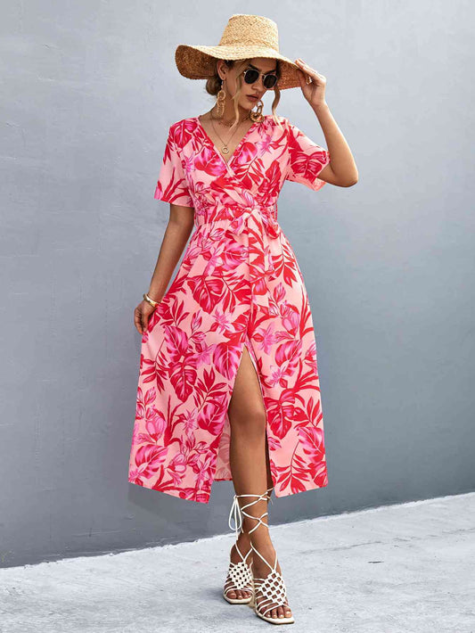 Robe mi-longue à imprimé floral, fente haute, surplis, col noué à la taille