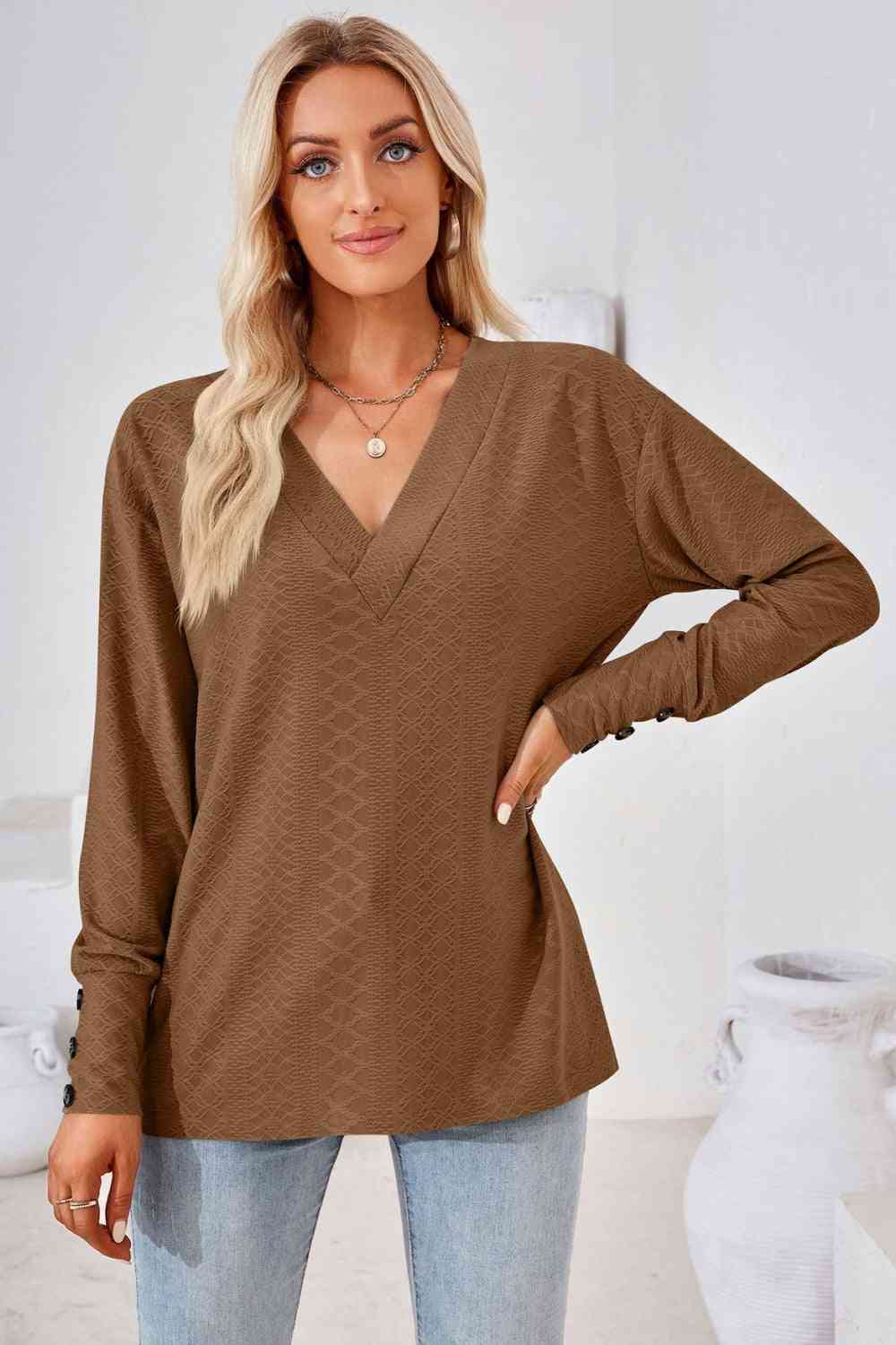 Blusa de manga larga con cuello en V