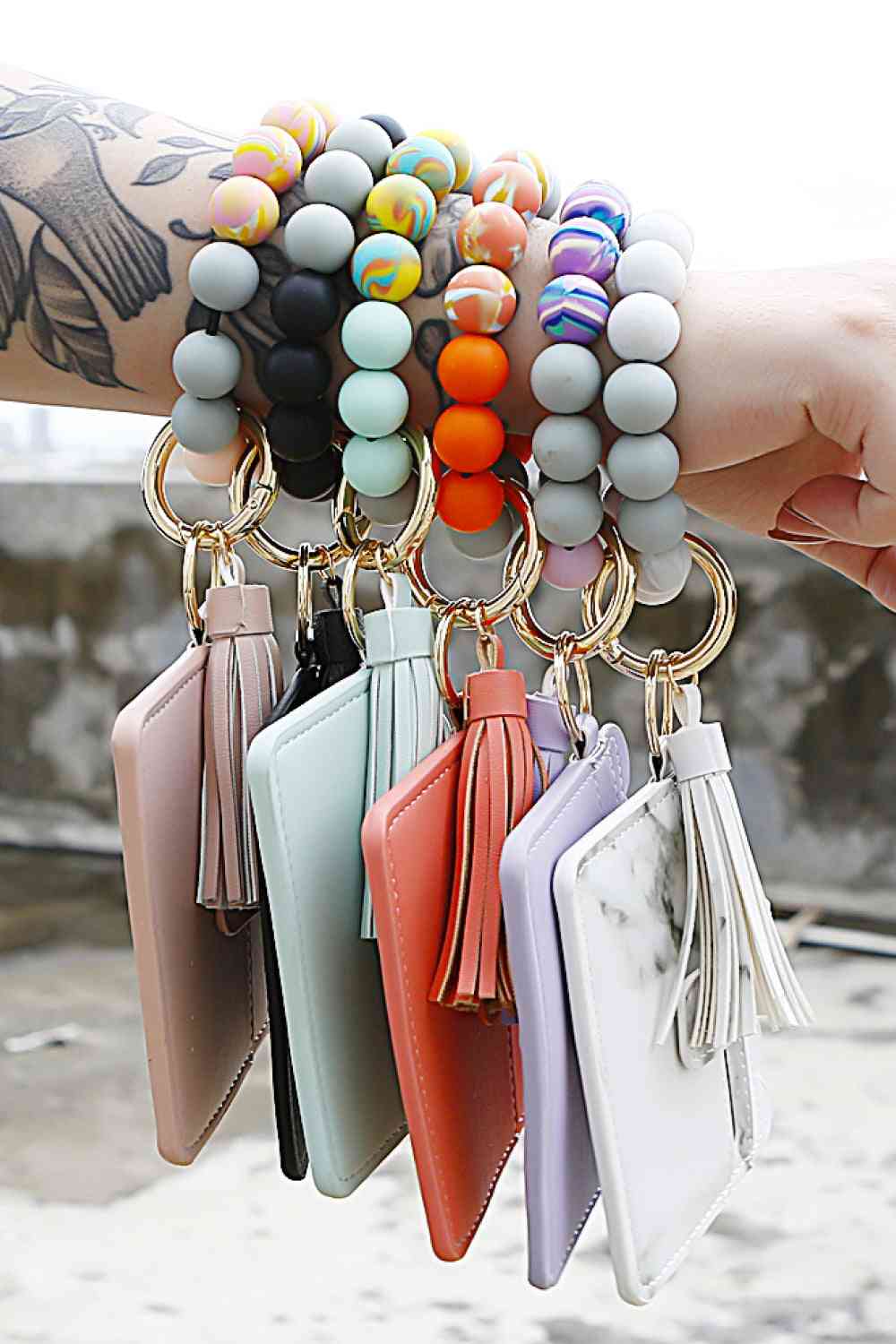 Porte-clés à pampilles perlées avec portefeuille