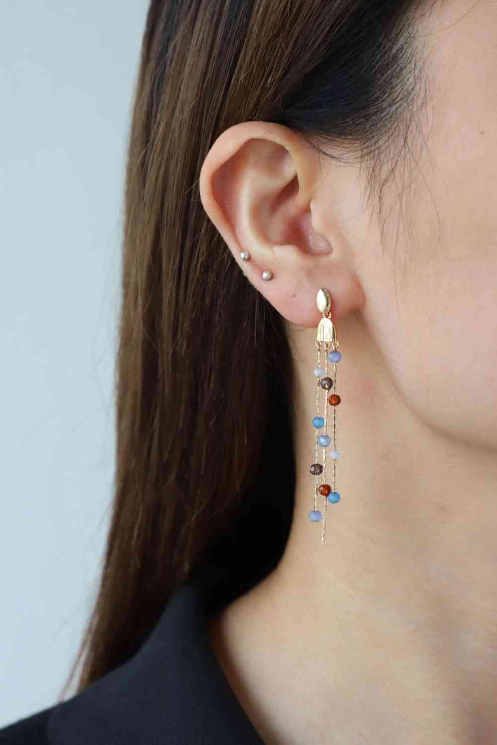 Boucles d'oreilles à longue chaîne perlée