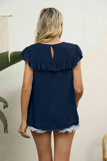 Blusa con volantes y encaje empalmado