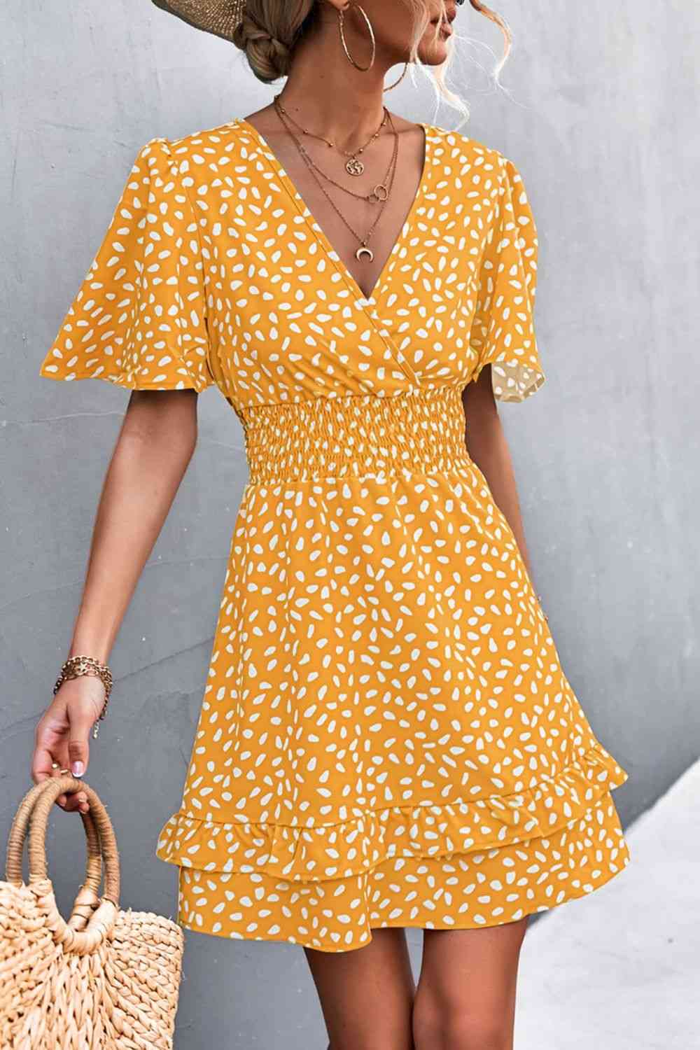 Robe surplis superposée imprimée à taille smockée