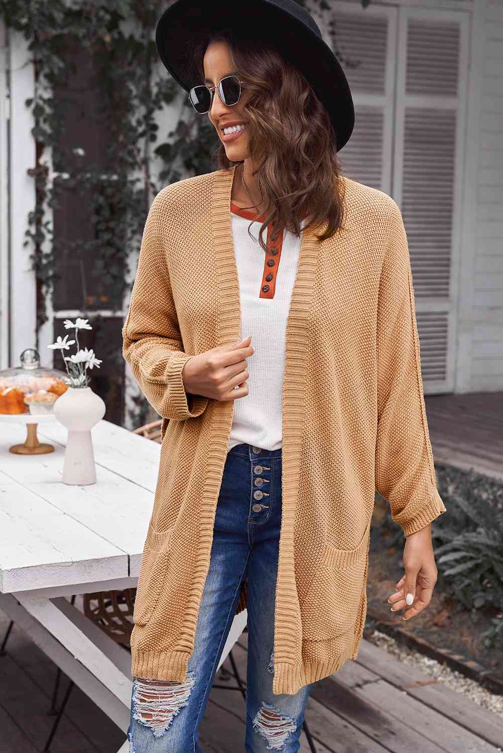 Cardigan long ouvert sur le devant avec poches et coutures apparentes