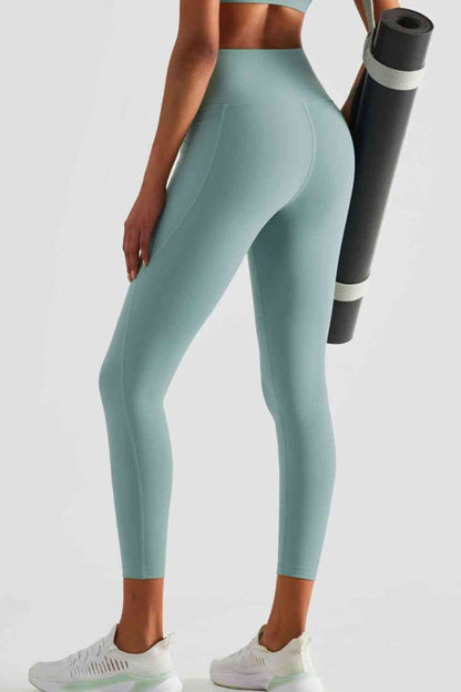 Leggings deportivos de cintura ancha con bolsillos