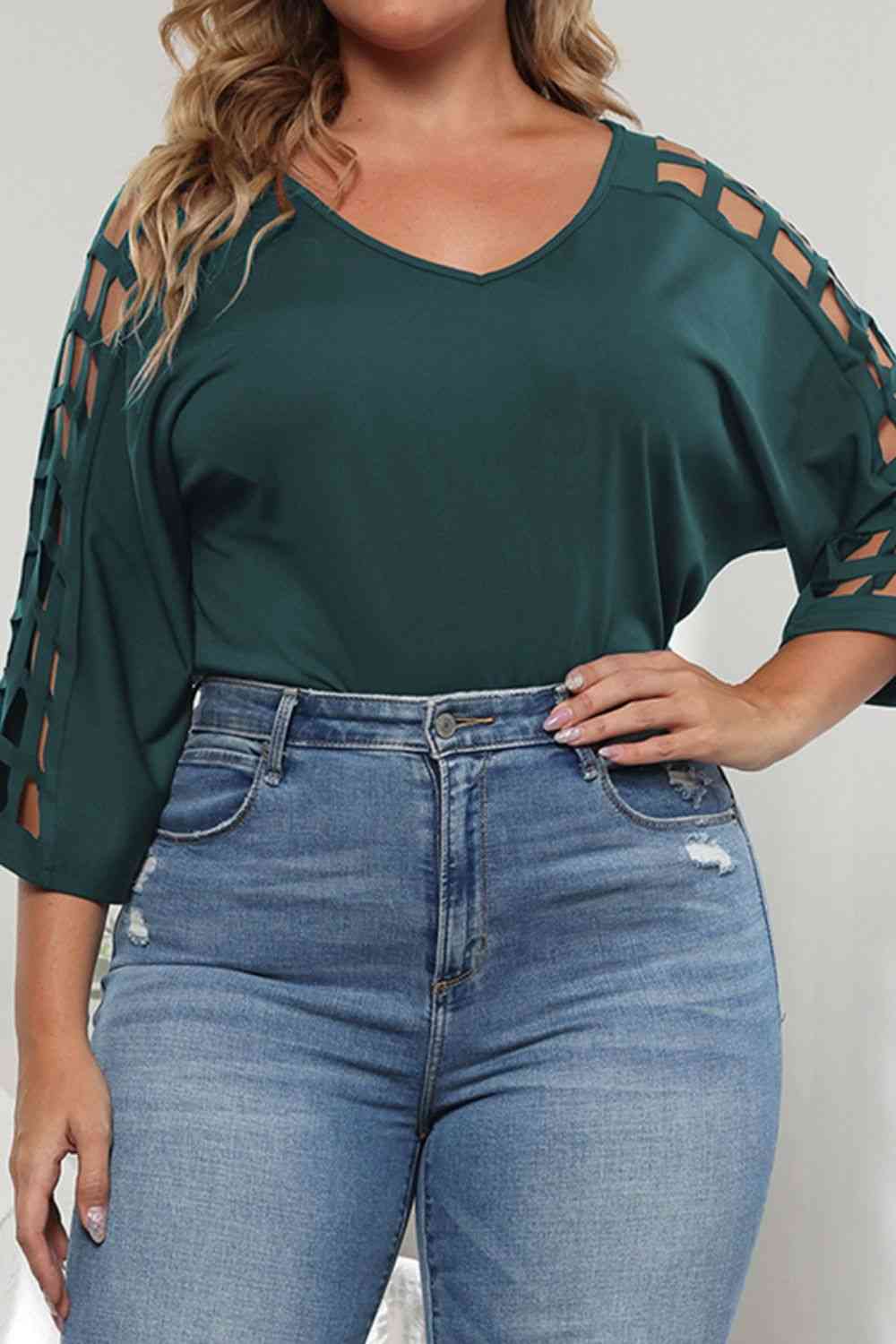 Blusa de manga tres cuartos con abertura de talla grande