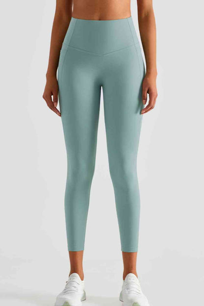 Leggings deportivos de cintura ancha con bolsillos