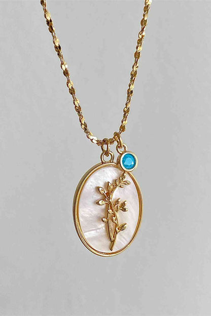 Collier en cuivre avec pendentif en forme de coquille de fleur