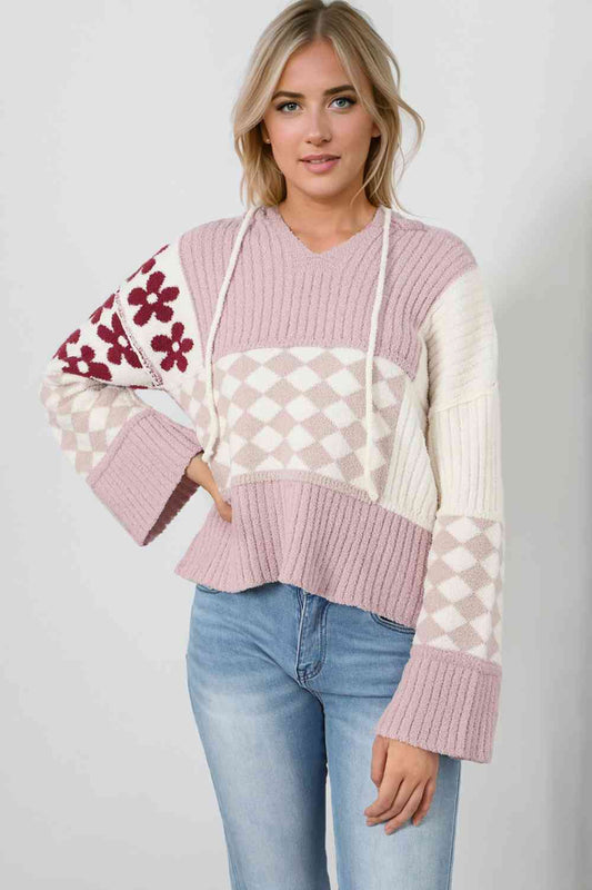 Suéter con capucha y bloques de color