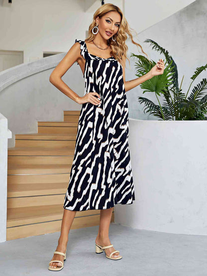 Robe midi bicolore à dos bas