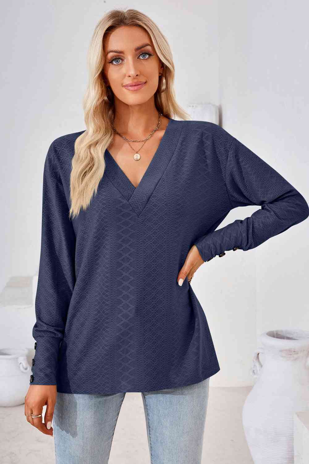 Blusa de manga larga con cuello en V