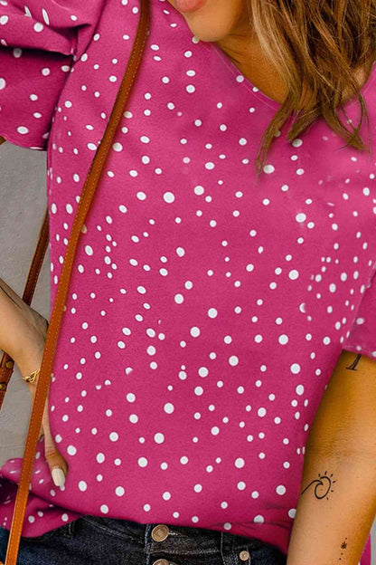 Blusa de lunares con cuello redondo y mangas abullonadas