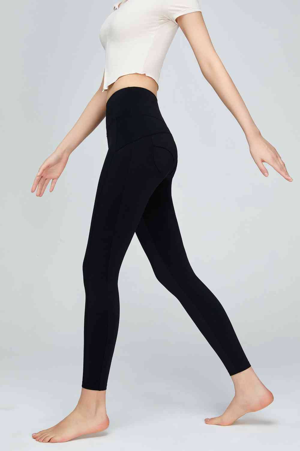 Leggings de sport à large ceinture et détails de couture