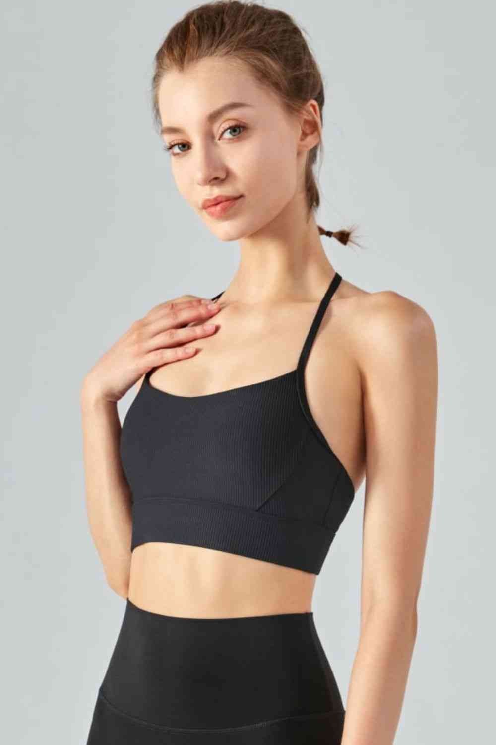 Camisole de sport courte côtelée à col licou et dos ouvert