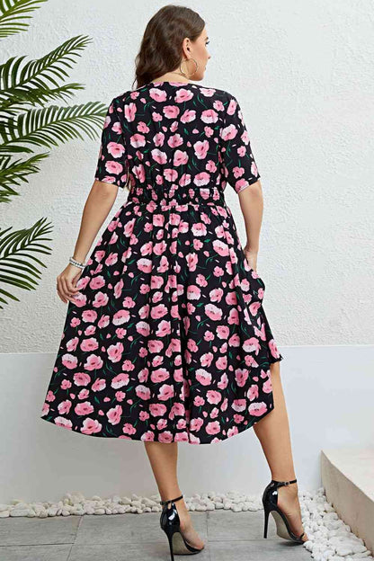 Vestido midi con sobrepelliz floral