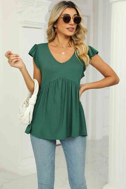 Blusa babydoll con mangas acampanadas y cuello en V