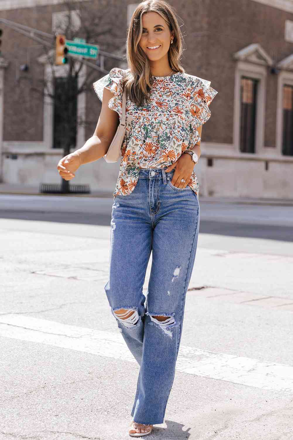 Blusa con cuello redondo y manga de mariposa estampada