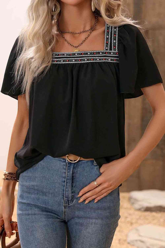 Blusa con mangas abullonadas y cuello cuadrado en contraste