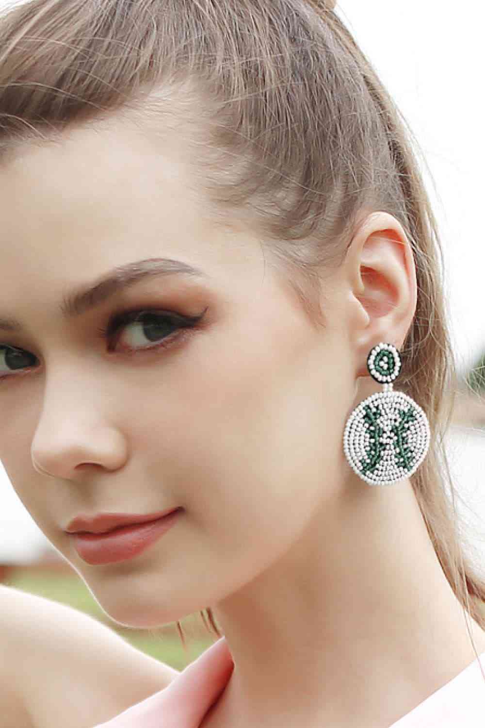 Boucles d'oreilles pendantes de forme ronde