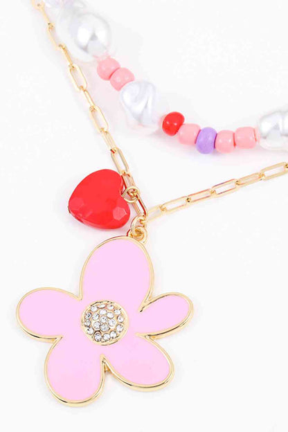 Collar en capas con colgante de flor y corazón