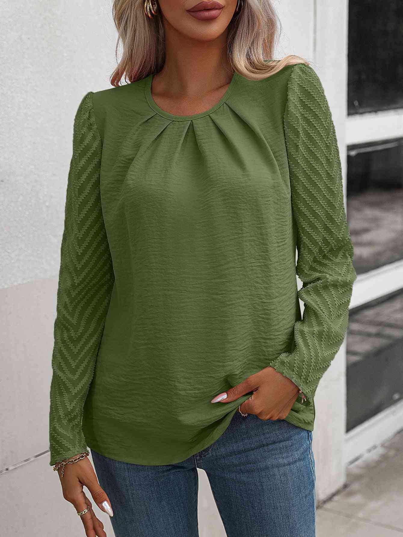 Blouse froncée à col rond et manches bouffantes