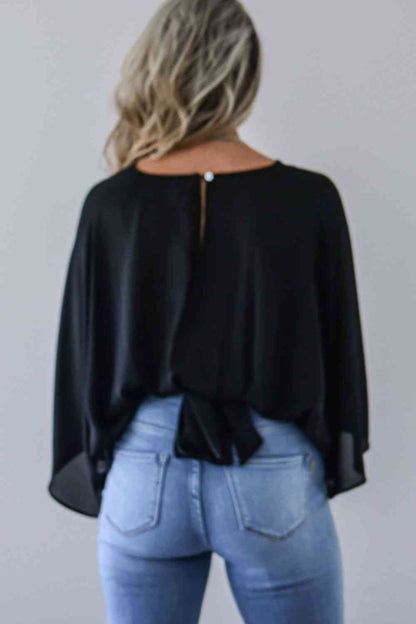 Blouse froncée à col en V et manches trois-quarts