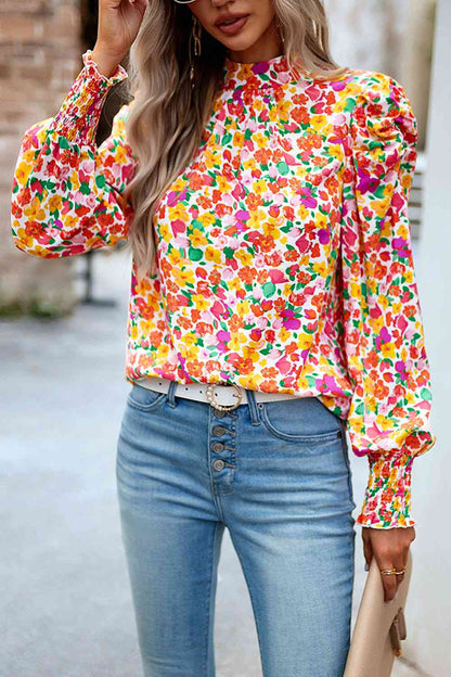 Blouse smockée imprimée à manches bouffantes