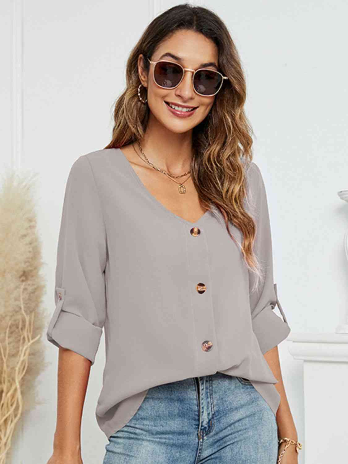 Blusa abotonada con cuello en V y manga larga Roll-Tap