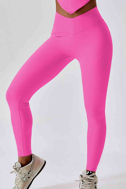 Legging de sport coupe slim avec large ceinture et poche arrière