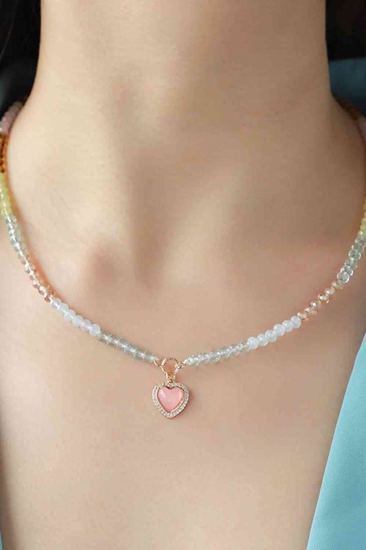 Collier de perles avec pendentif coeur