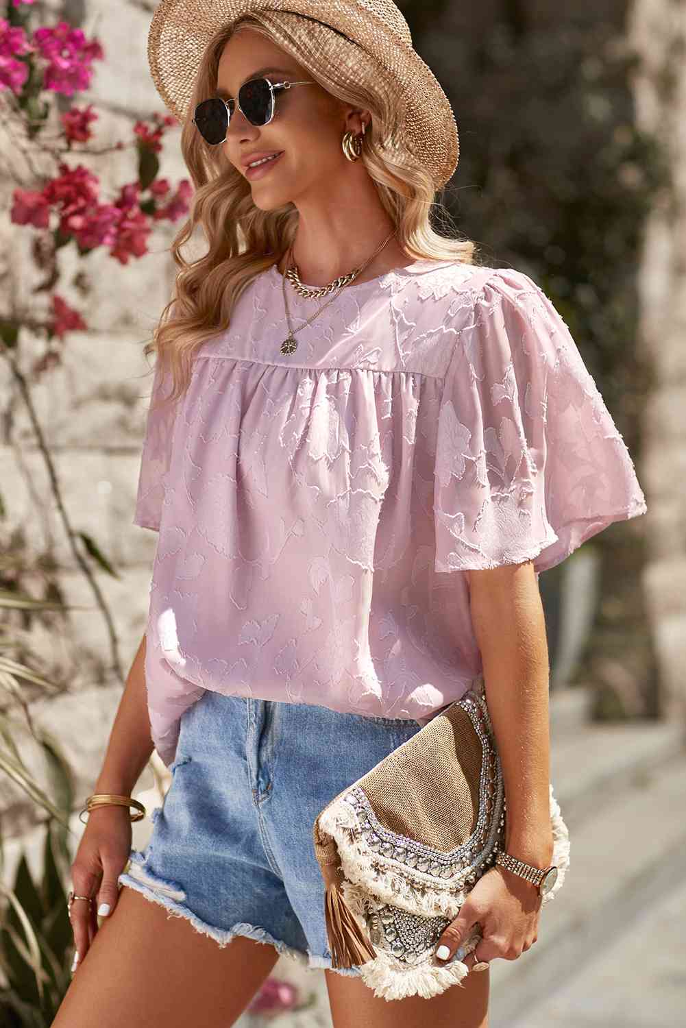 Blusa con cuello redondo y manga abullonada