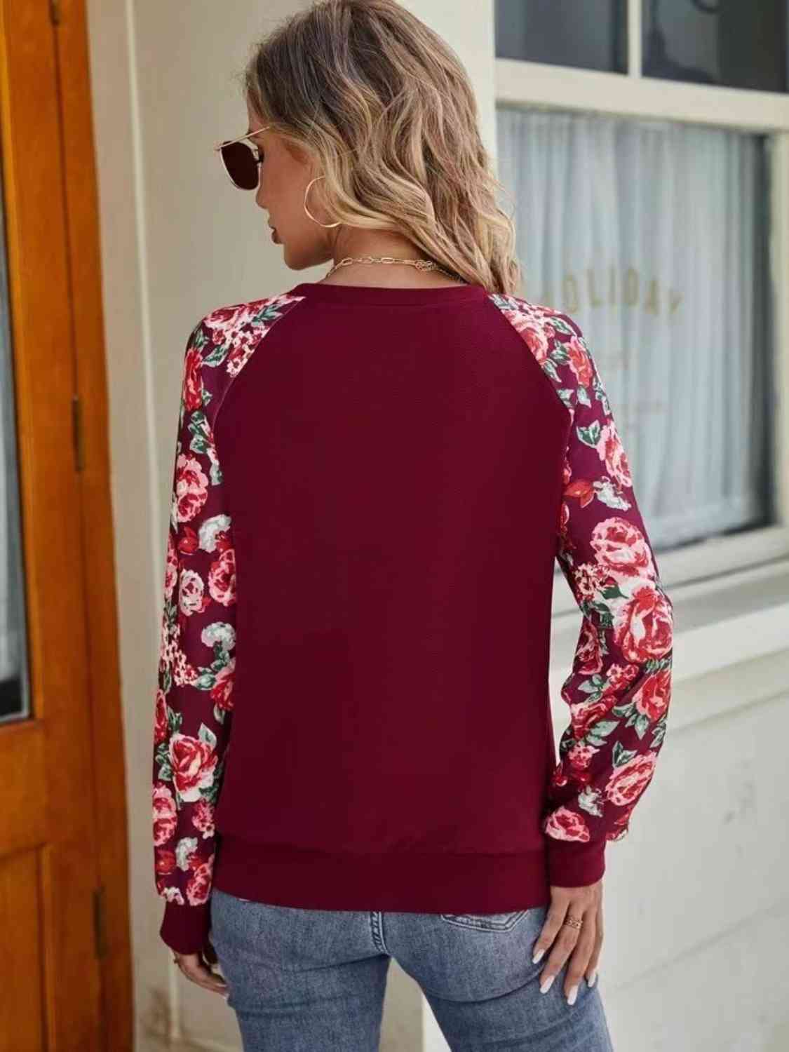 Sweat-shirt fleuri à manches raglan et col rond