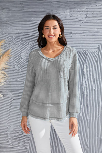 Blusa de punto gofre con cuello en V y bolsillo en el pecho