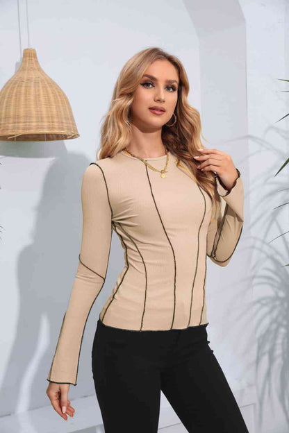 Blusa de manga larga con cuello redondo de canalé