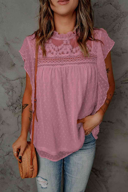 Blusa con cuello con volante y volantes de lunares suizos