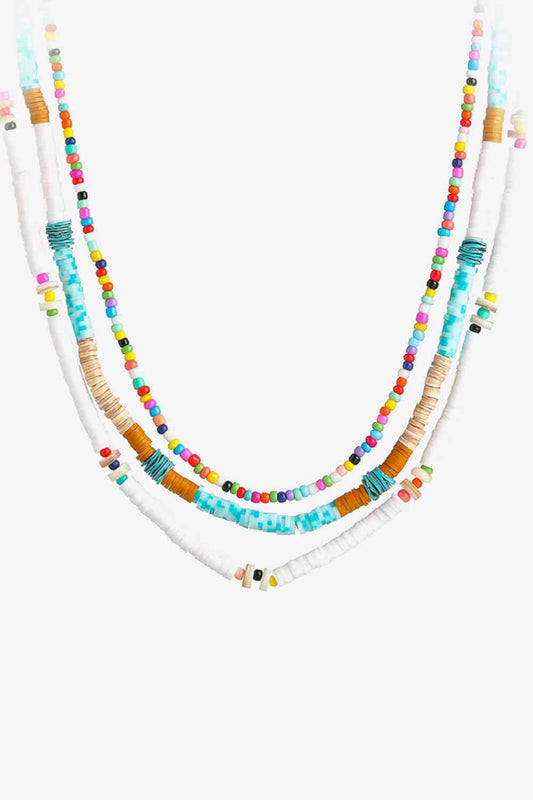 Ensemble de trois pièces avec collier de perles multicolores