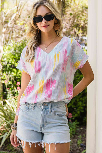 Blusa de manga corta con cuello en V alto y bajo