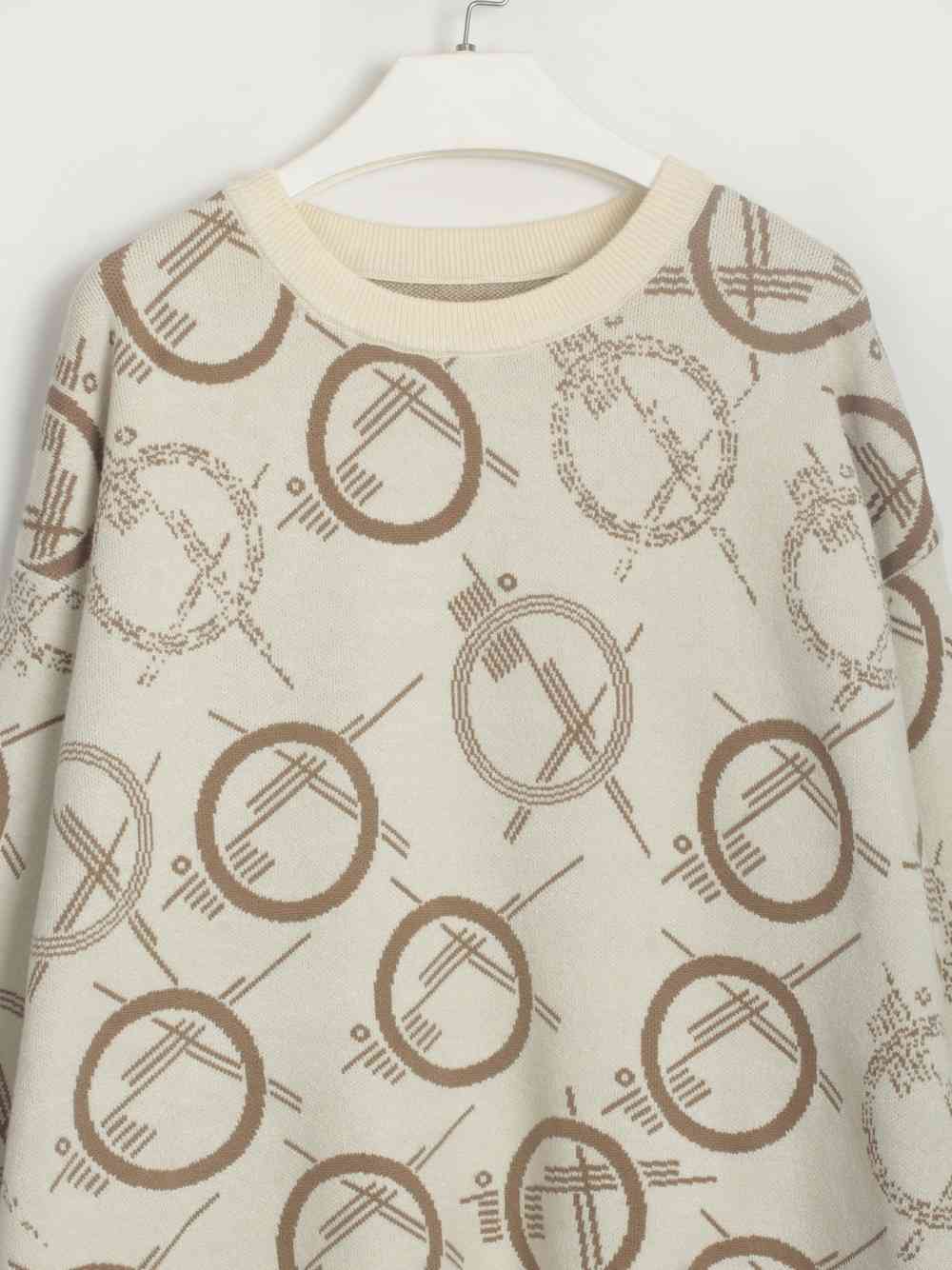 Suéter estampado con dobladillo con cordón