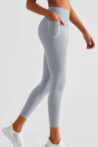 Leggings deportivos de cintura ancha con bolsillos