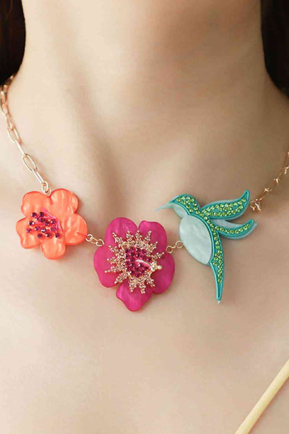 Collier à décor de strass avec fleurs et oiseaux