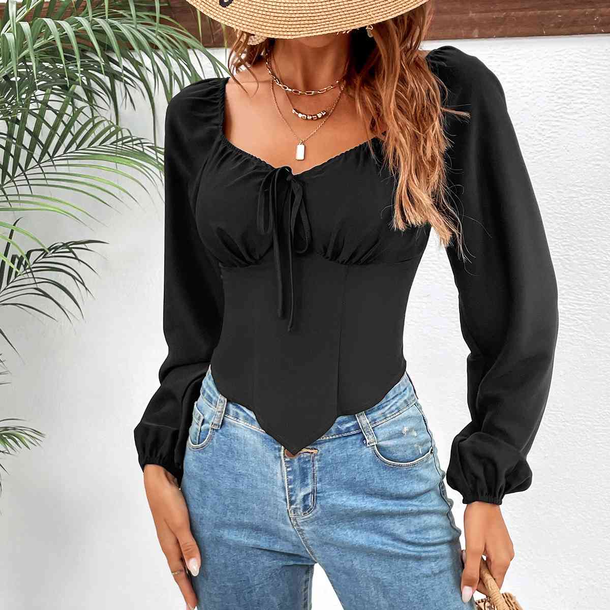 Blusa con cuello cuadrado y manga raglán