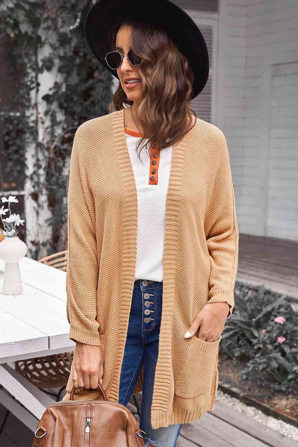 Cardigan long ouvert sur le devant avec poches et coutures apparentes