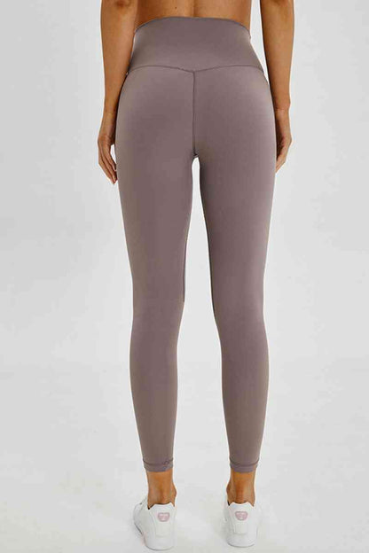 Leggings de sport à large bande sans couture à taille