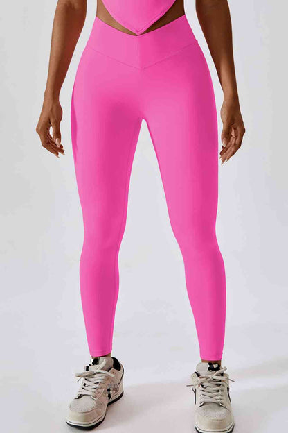 Legging de sport coupe slim avec large ceinture et poche arrière