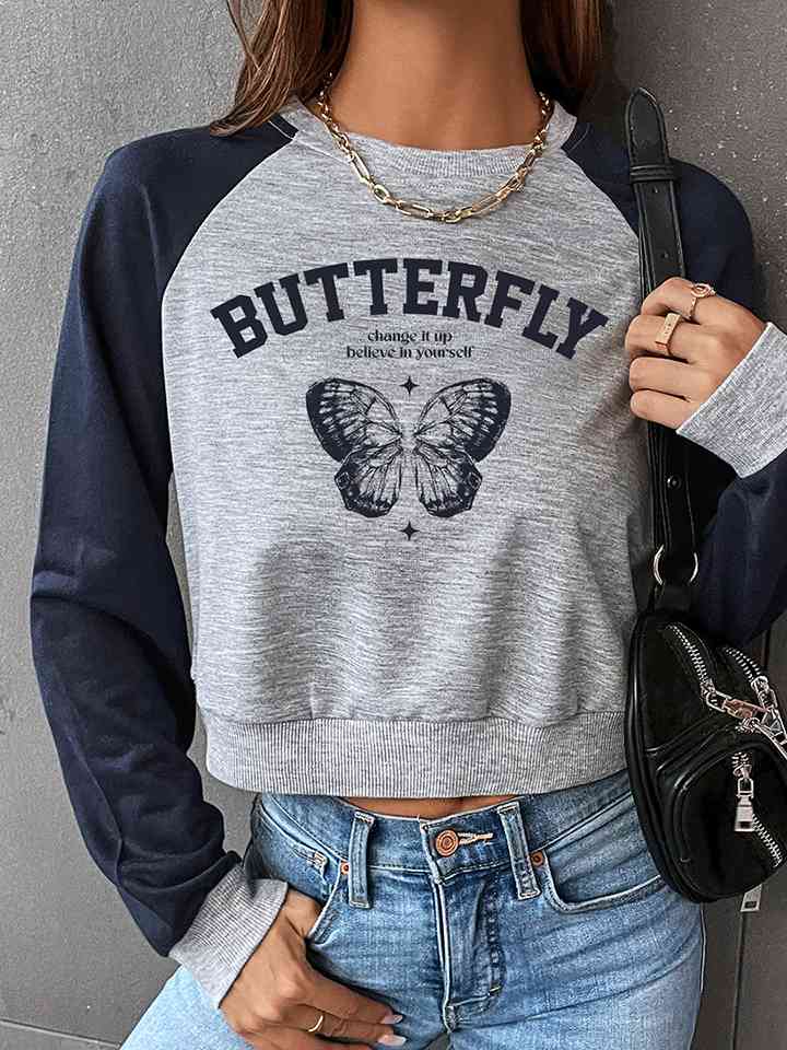 Sweat-shirt à col rond et manches raglan avec motif papillon